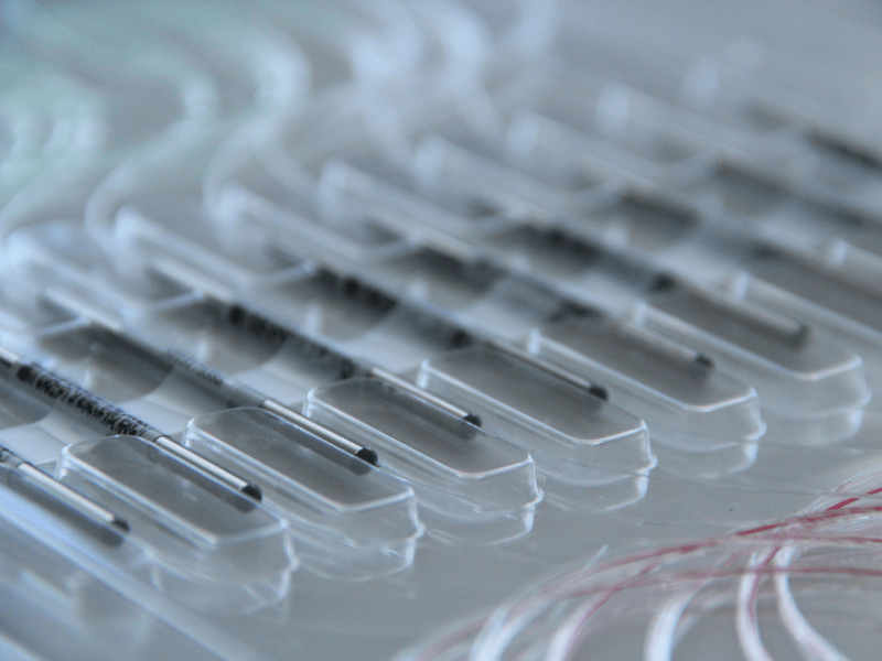 Fiber-optic delivery systems used in medical laser procedures for minimally invasive treatment